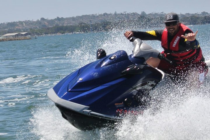 jet skier riding fast on the water