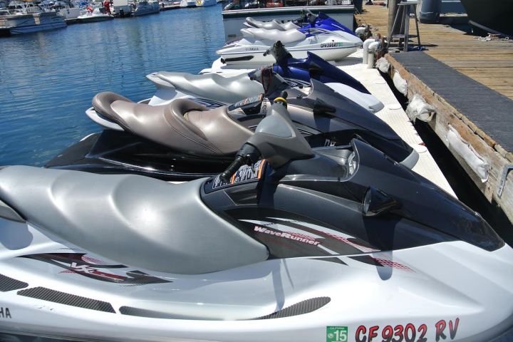 jet skis lined up at dock